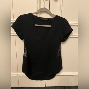 Zara black short sleeve blouse with lace sides. Size small.